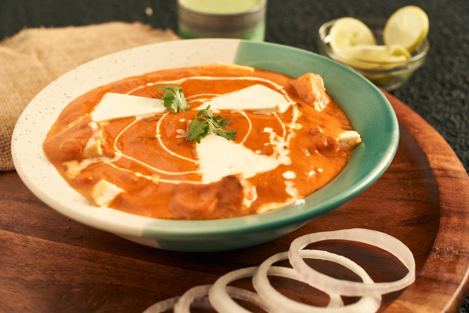 Butter chicken with a swirl of cream in a bowl